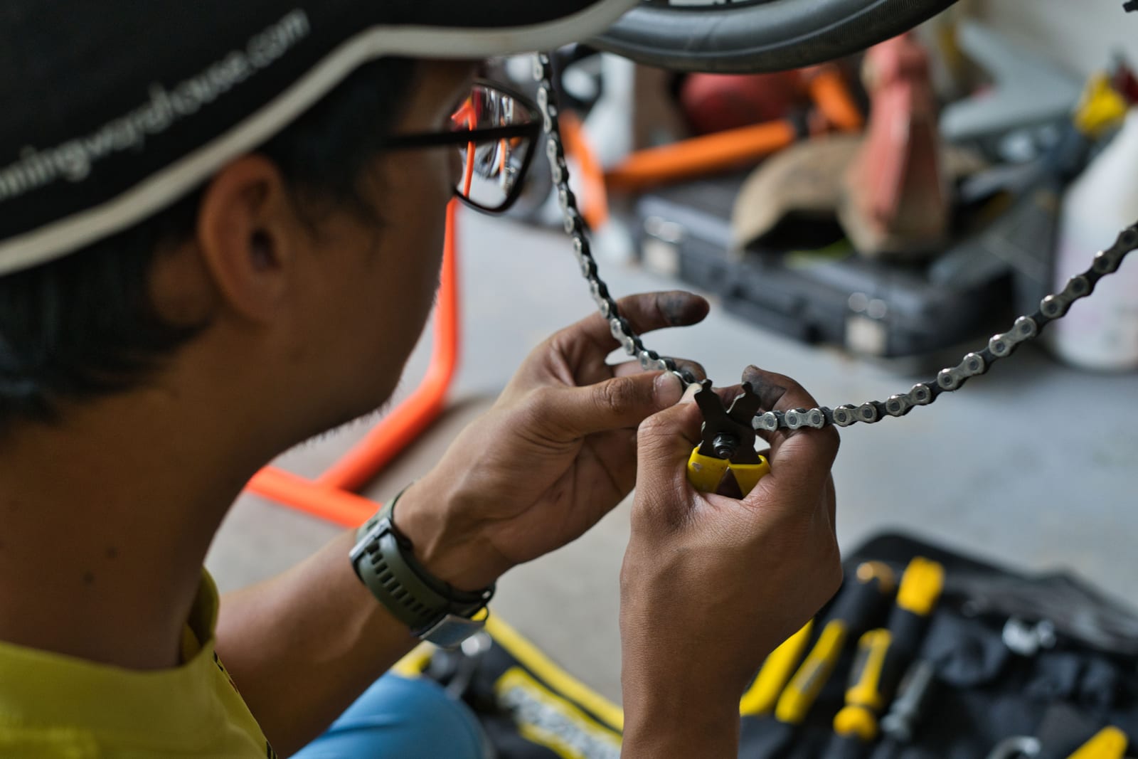 A workshop stand with a road bike being set up.